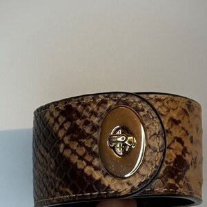 Coach snakeskin embossed leather bracelet turnlock